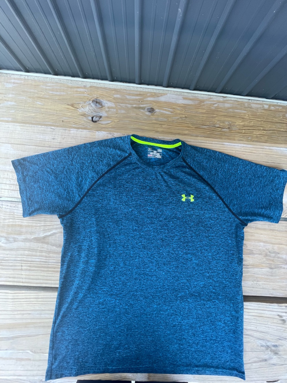 Under Armour Men’s Heathered Teal Crewneck Performance Shirt with Neon Logo